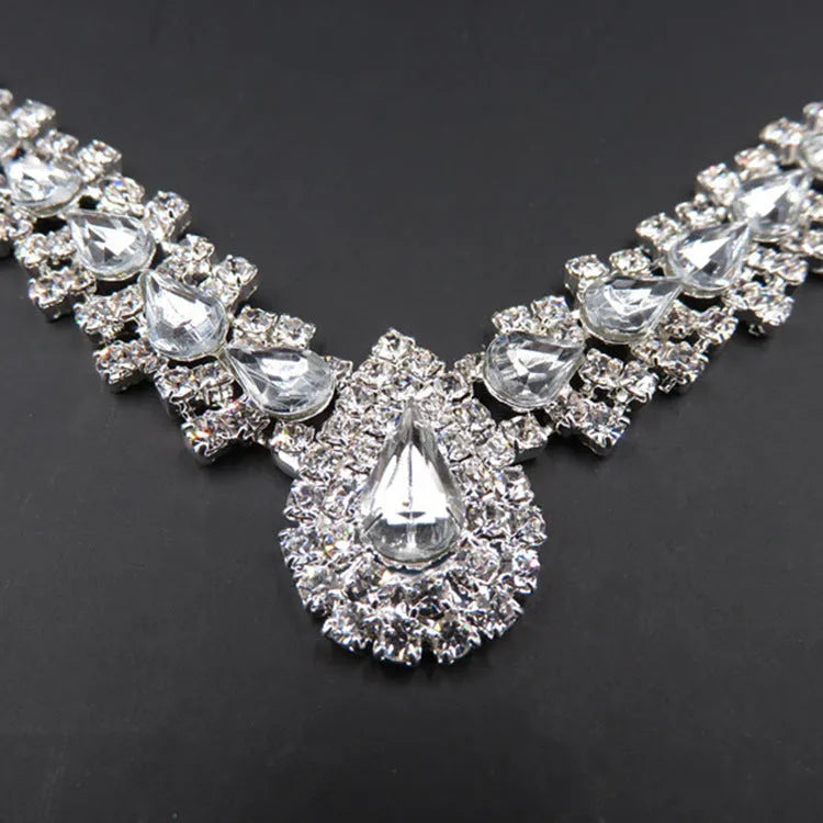 Bride wedding accessories earrings set with drop necklace on display