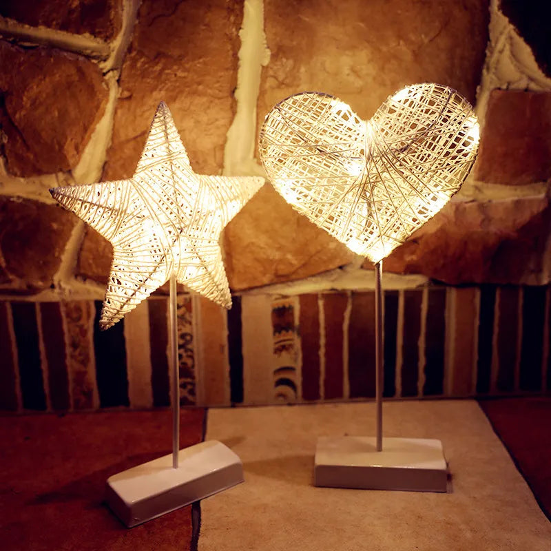 Rattan star-shaped LED lamp with copper wire frame measuring 23x40cm