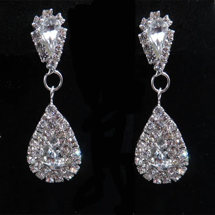 Bride wedding accessories earrings set with drop necklace on display