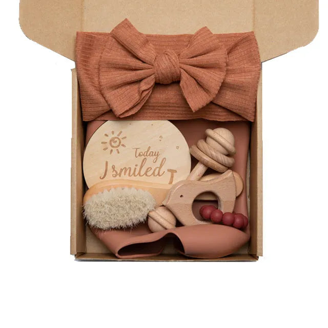 Newborn baby shower toy set of six bath toys in wood and chemical fibre, available in blue, brown, or peach