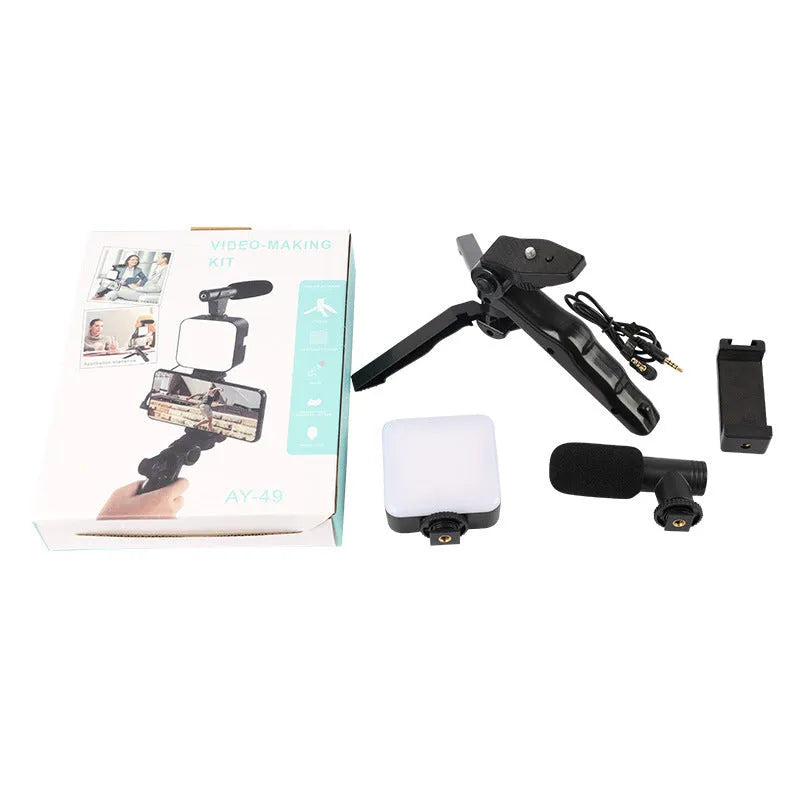 Mini square outdoor camera flash on a small tripod with a rotatable head