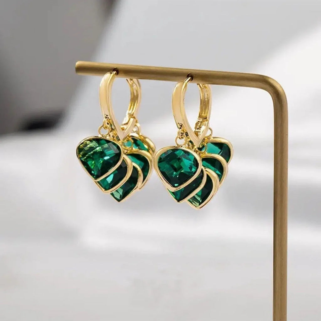 Green heart-shaped ear clip earrings with dancing shade design and artificial gemstones