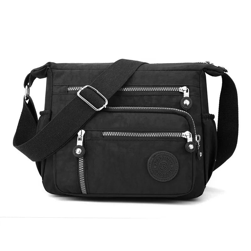 Nylon messenger shoulder bag in square vertical design with single strap and lining