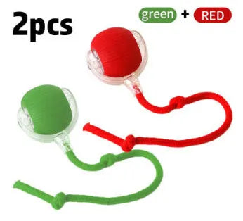 Flexible silicone rolling ball cat toy in plush red, green, and grey colours