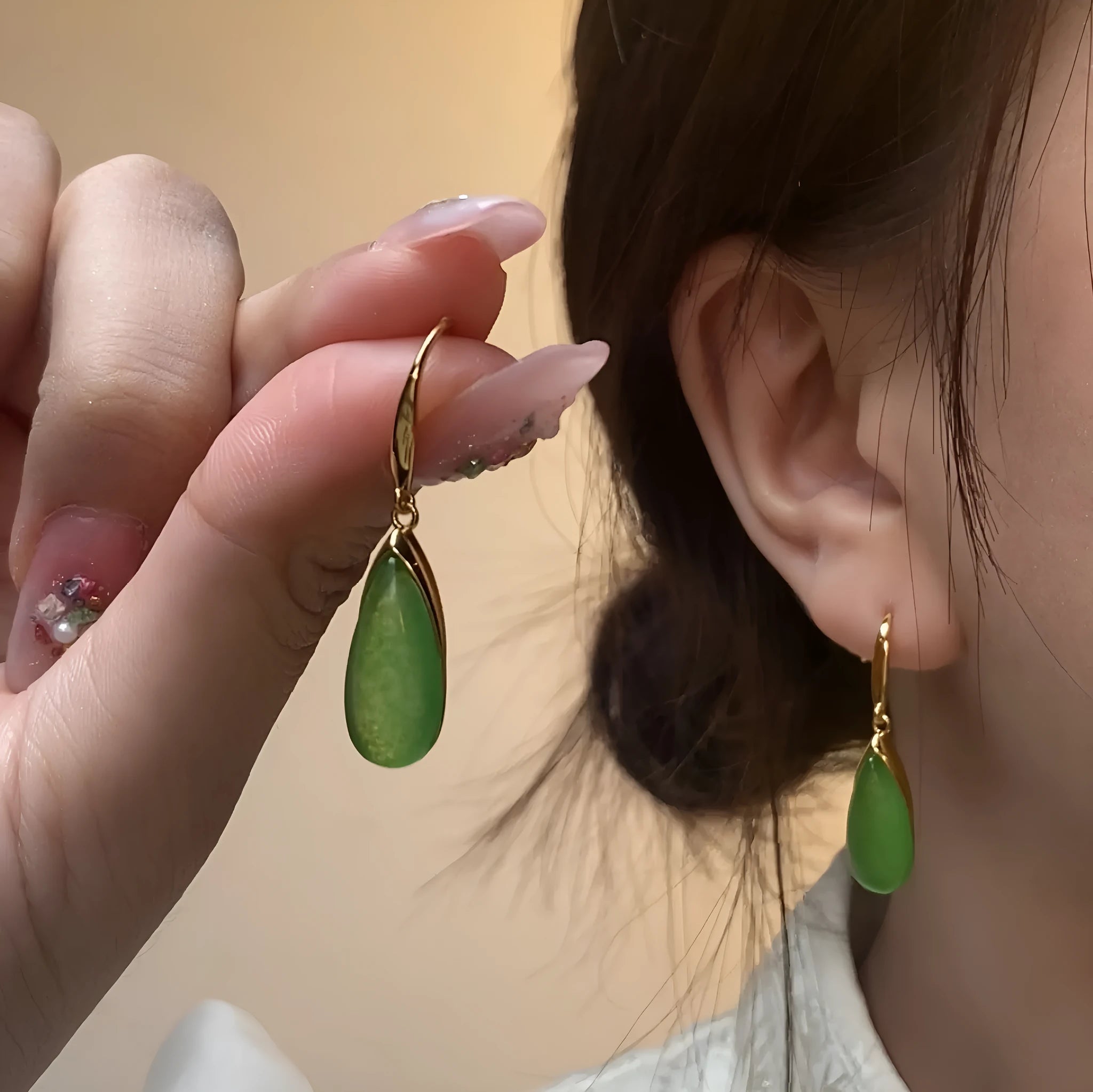 Retro Chinese-style geometric earrings with jade green electroplated finish and water droplet design on copper base