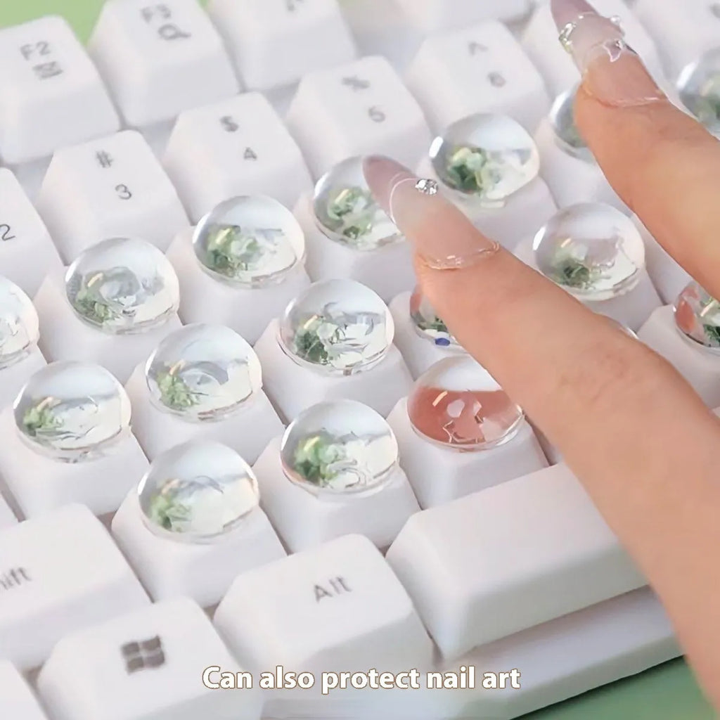 PVC crystal glass ball keyboard stickers in 12x6mm and 16x8mm sizes on a universal keyboard