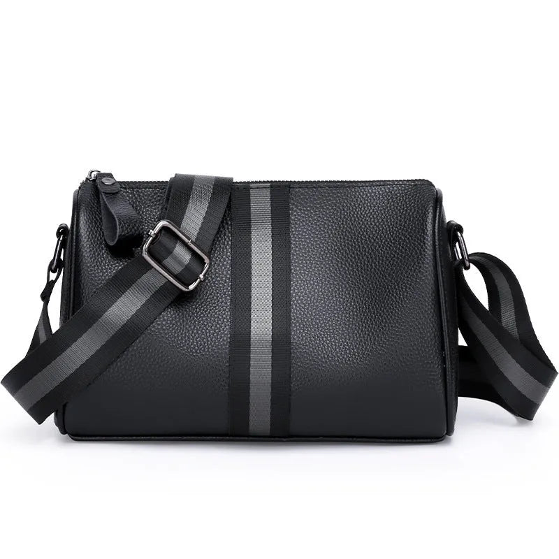 Black genuine leather crossbody shoulder bag showing 24cm height with polyester lining