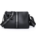 Black genuine leather crossbody shoulder bag showing 24cm height with polyester lining