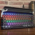 Black Dot retro typewriter style Bluetooth mechanical keyboard with colourful backlighting.
