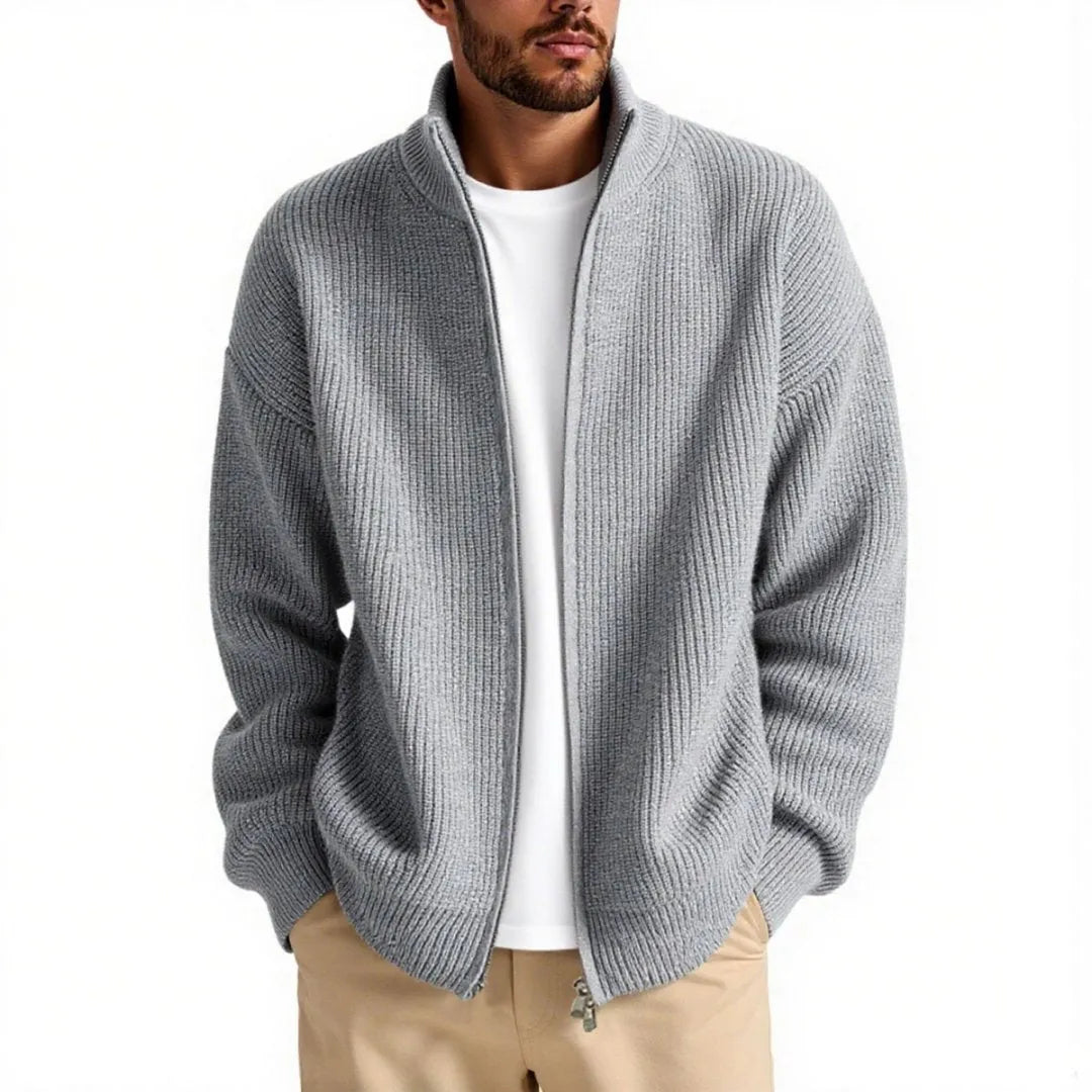 Loose-fit grey men's cardigan sweater on a hanger, front view.