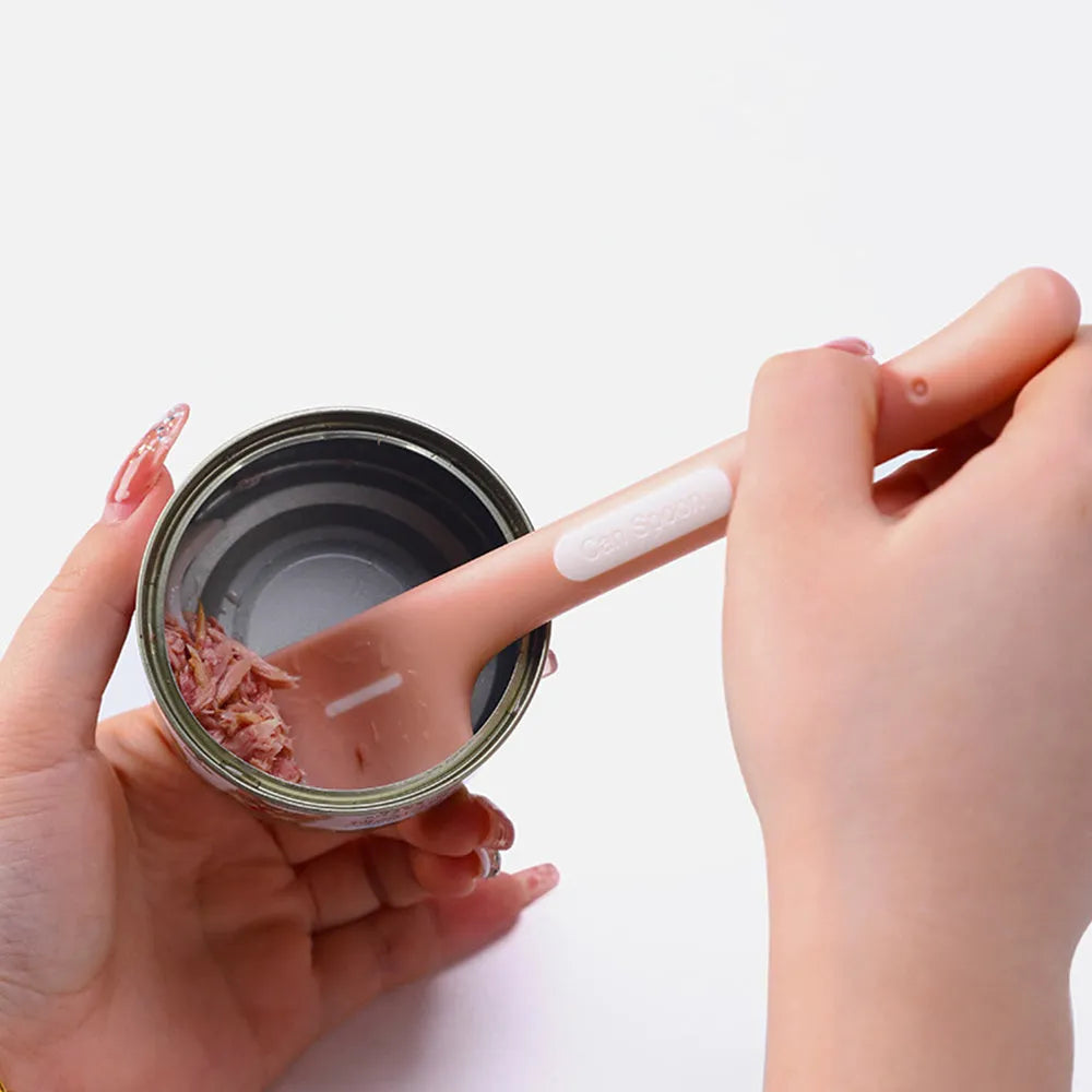 Long green TPR pet food spoon with right-angle head for feeding from tins