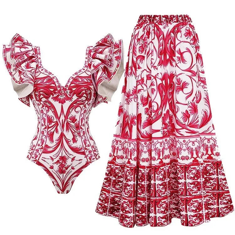 Women's printed polyester one-piece swimsuit on a hanger.