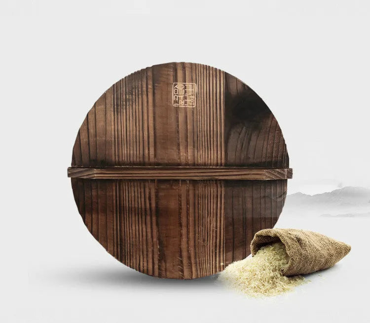 Traditional handmade iron wok pan with wooden handle and induction-compatible base