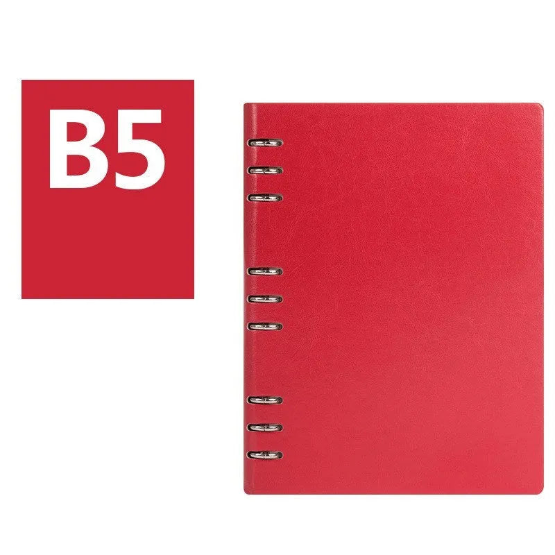 Loose-leaf business notebook with imitation leather cover in multiple colours, open to show beige paper.