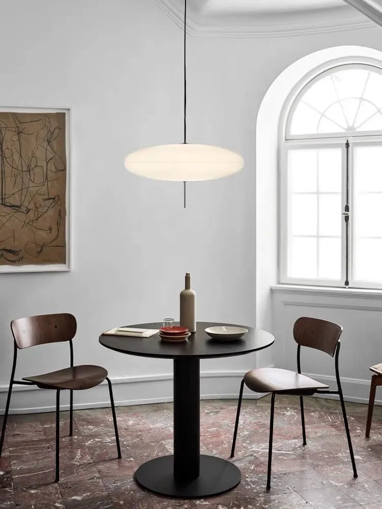 Nordic modern retro UFO pendant chandelier light fitting in a black and white colour scheme.