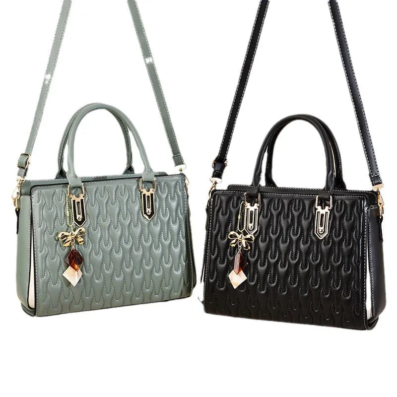 Women's messenger shoulder bag in gold colour showing outer pocket sandwich design and organised interior compartments