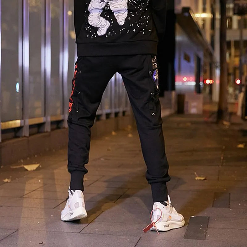 Cotton rope harem pants for men with cartoon hip hop print in black loose fit streetwear trousers