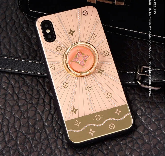 Luxury diamond and gold iPhone ring stand accessory in rose gold and white gold colours
