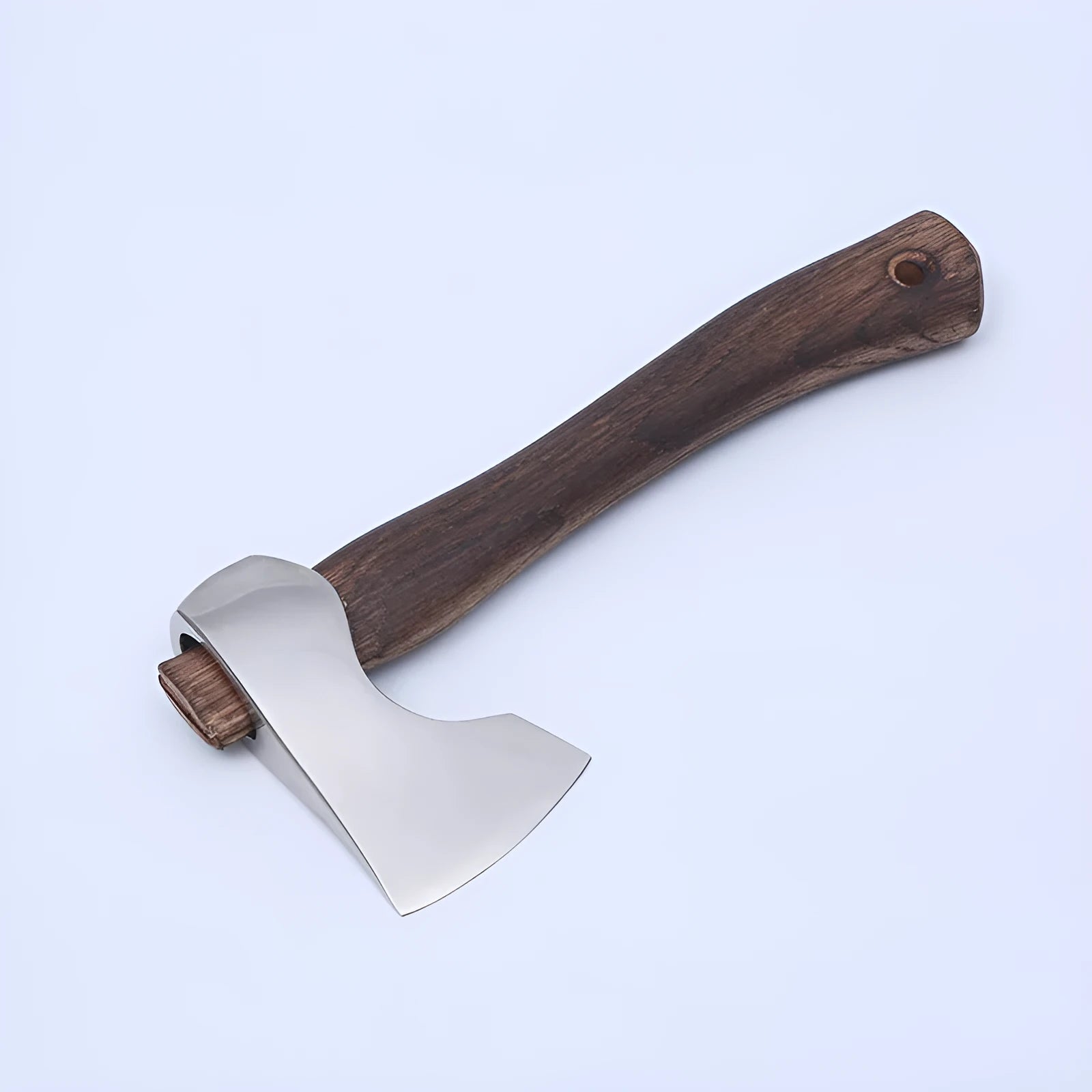 Camping axe with wooden handle and high carbon steel head.