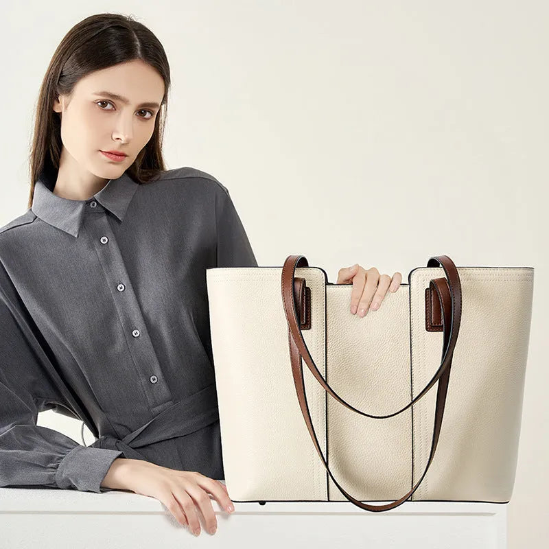 Women's black genuine leather commuter shoulder bag with multiple internal compartments