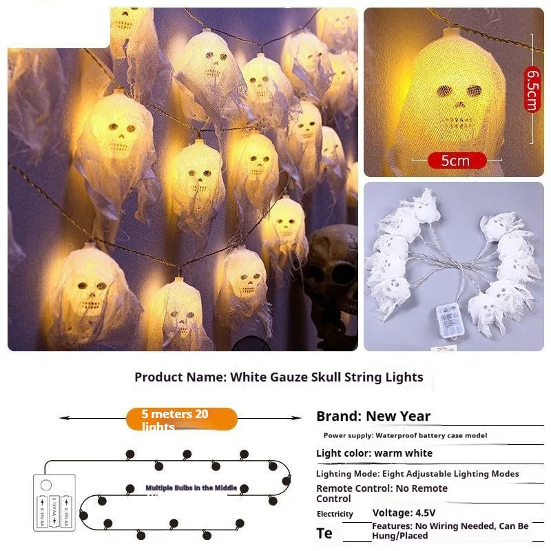 Halloween battery-powered coloured LED string lights on a plastic spool with battery box, options for 1.5m or 2.5m length.