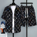 Men's grey casual polyester short sleeve top and matching shorts laid flat.