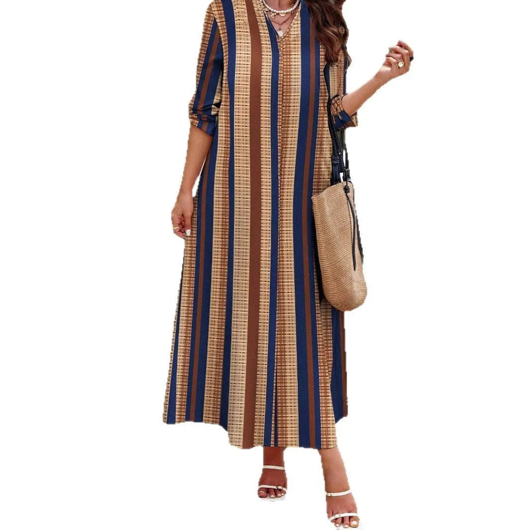 Camel coloured vertical striped V-neck knitted dress with A-line skirt and long sleeves