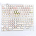 MOG Steamed Bread PBT key cap set with Bread Bear character design showing 143+3 keys for mechanical keyboards