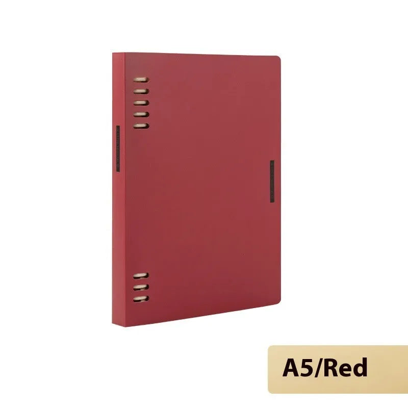 Loose-leaf spiral notebook with PP cover open, showing raw wood pulp pages in A5 or B5 size.