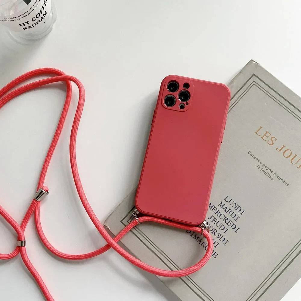 Liquid silicone phone case with crossbody lanyard for iPhone 13 Pro in black, showing rear cover and attached strap