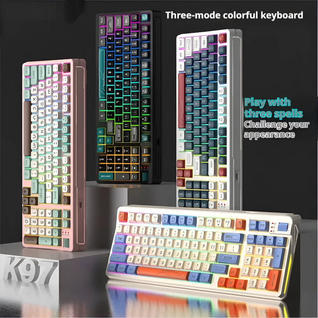 Luminous plastic computer keyboard in one of four colour combinations on a desktop.