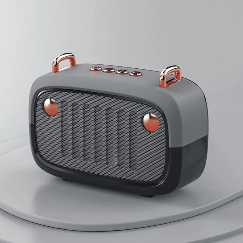 Compact portable Bluetooth mini speaker with USB port and control buttons, shown in black.
