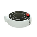 Round black solar-powered car perfume diffuser with USB port on a car dashboard.