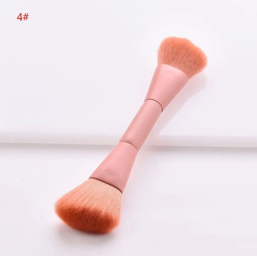 Ten makeup brushes with wooden handles arranged showing different brush head types including powder, foundation and double-headed tools