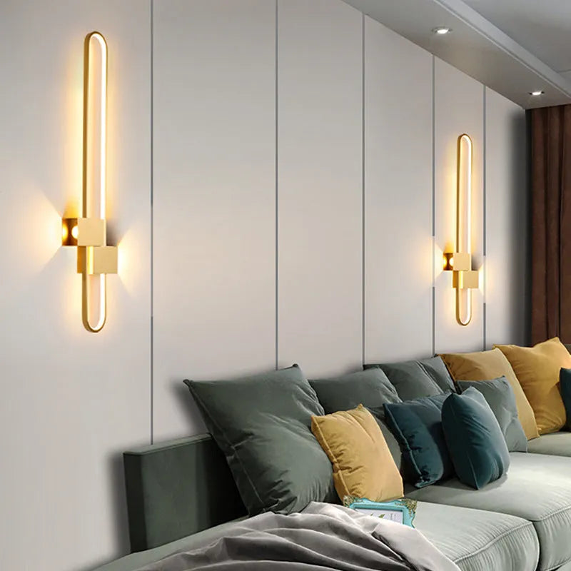 Modern minimalist wall lamp with iron shade and LED light in black or gold frame finish