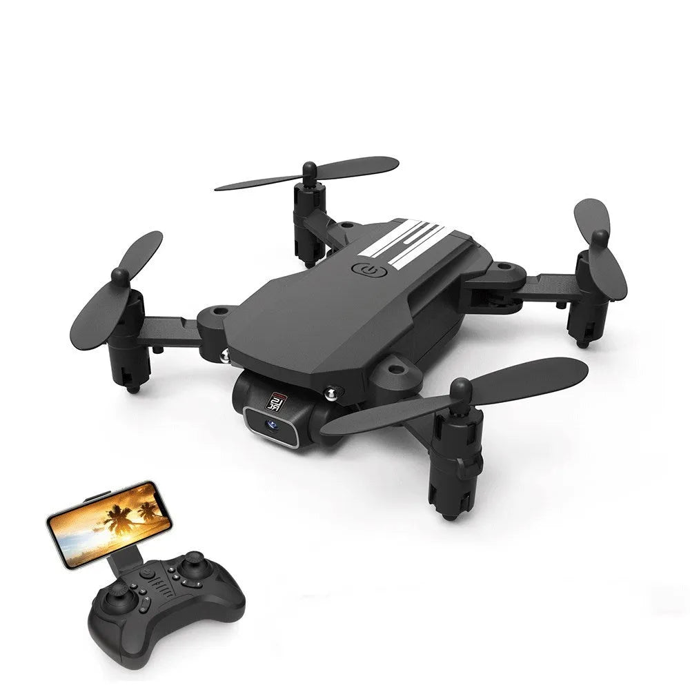 Mini folding aerial drone with 4K camera, open on a flat surface, showing foldable arms and LED lights