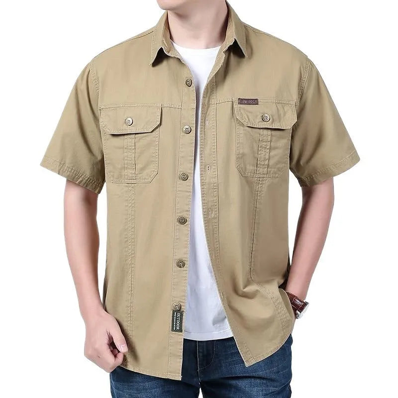 Men's cotton short sleeve loose fit cardigan shirt in dark blue on a model, summer workwear style