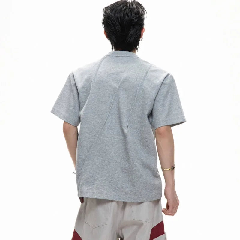 Men's loose fit cotton T-shirt with pleated detailing and asymmetric stitching in black colour