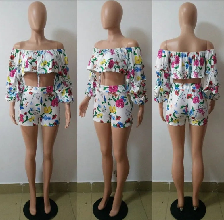 Women's digital print two-piece outfit with pile sleeves on short-sleeve top and matching shorts in multi-colour pattern