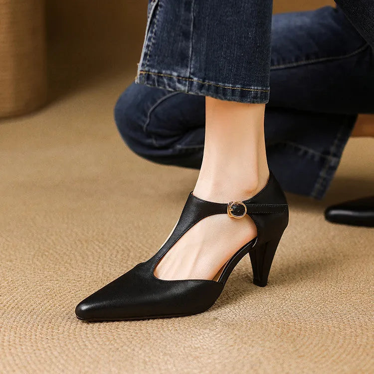 Brown retro women's T-strap closed toe sandals with a buckle and short block heel.