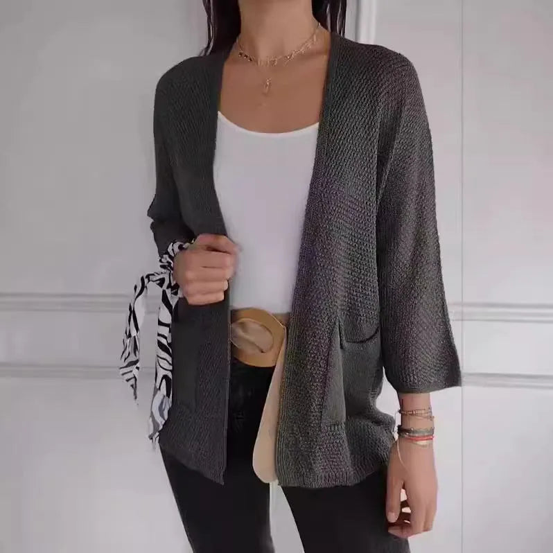 Women's thin waffle knit cardigan coat with nine-quarter sleeves and front pockets in army green.
