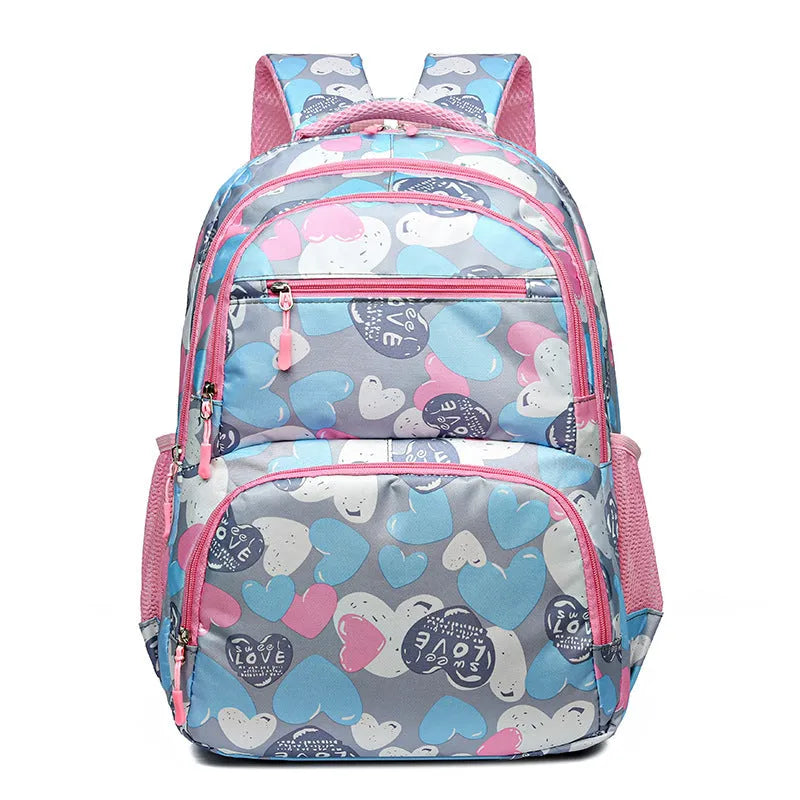Children's large capacity Oxford cloth schoolbag with air pillow belt in blue, pink, gray, or rose red for burden alleviation
