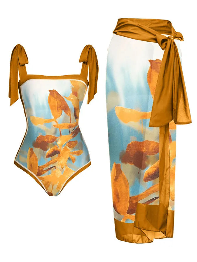 Women's two-piece floral printed polyester swimsuit with matching hip skirt in conservative style