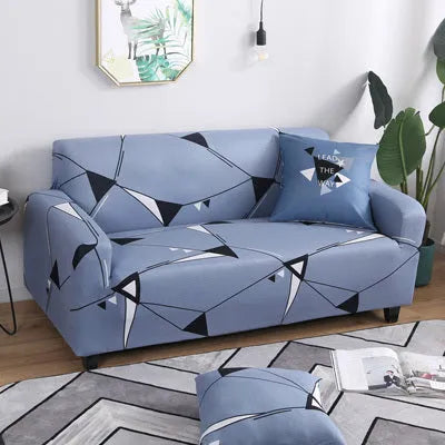 Geometric patterned stretch sofa slipcover fitted on a modern two-seater sofa.