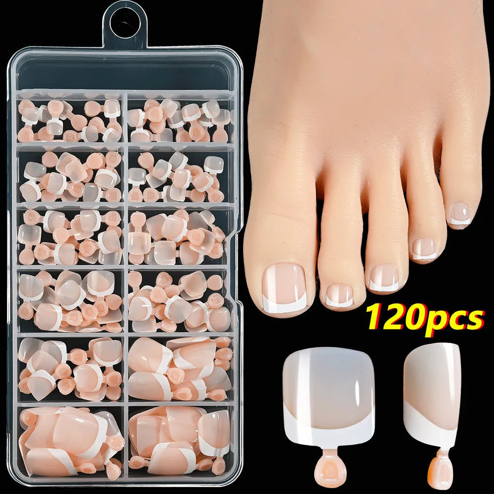 Open box showing 120 French white tip nude square false toe nails in assorted shades.