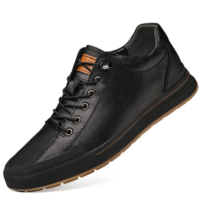Men's white leather casual shoes with flat heel and round toe on a plain background