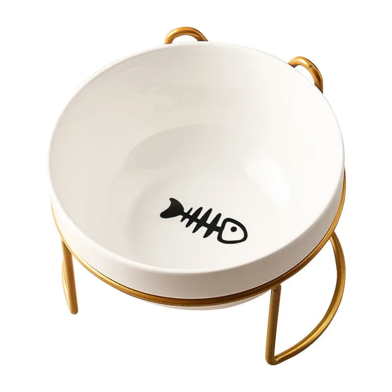 White ceramic cat bowl with decorative patterns on iron frame with cat ear details