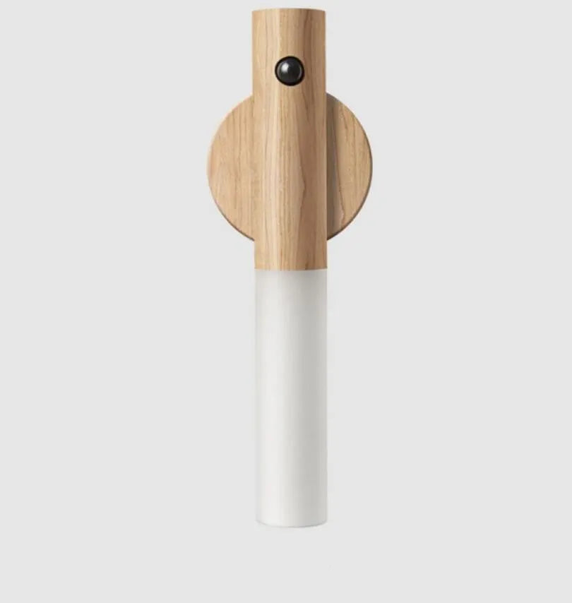 Smart sensor LED desk lamp in wood and acrylic glass on a desk.
