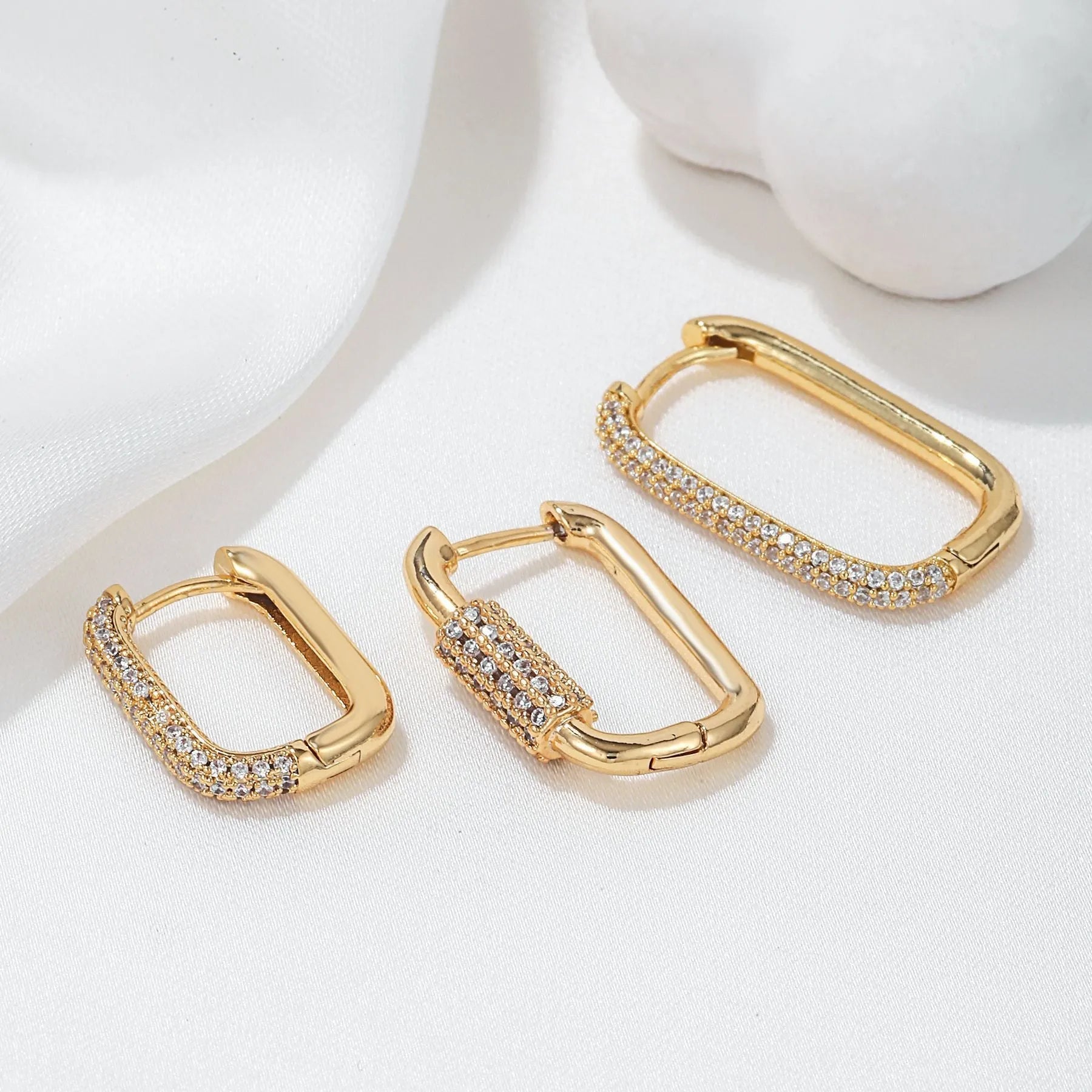 Geometric copper ear clip three-piece set with micro inlaid zircon detailing in gold and white finishes