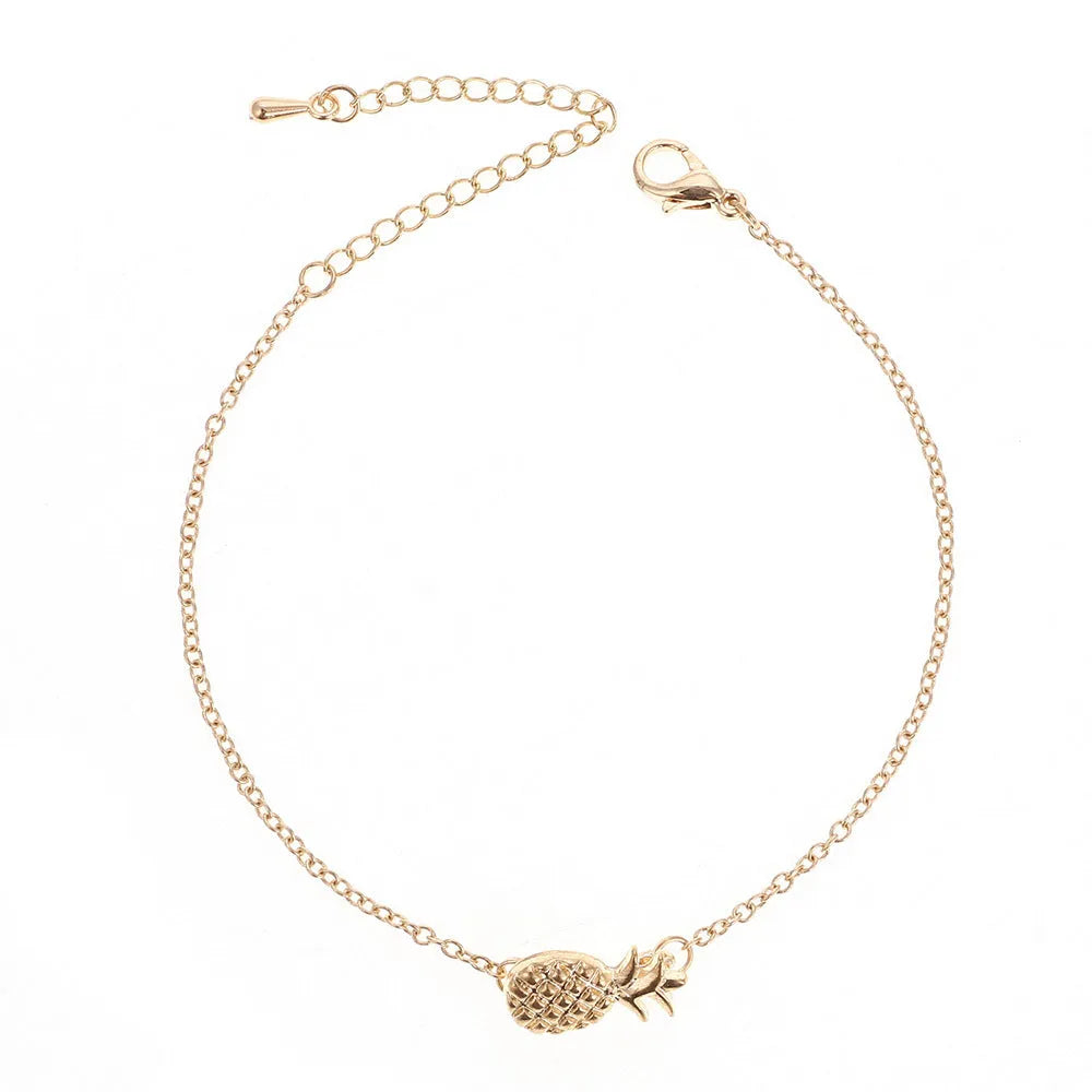 Women's alloy bracelet featuring a simple pineapple charm in a gold or silver metallic finish.